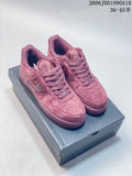 Four Nike Air Force 1 low-top sneakers shown from the side in pink, white, gray, and mauve colorways.
