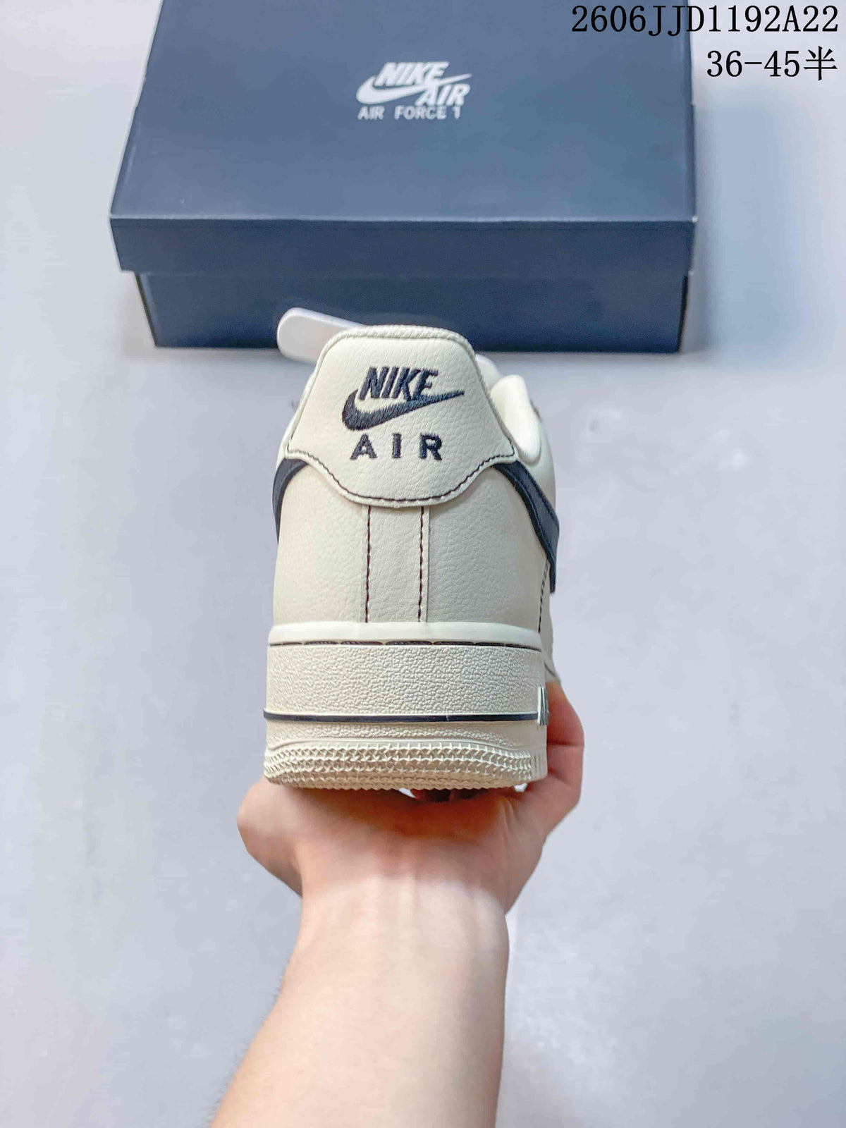 Rear view of the sneaker showing the heel panel and Air branding