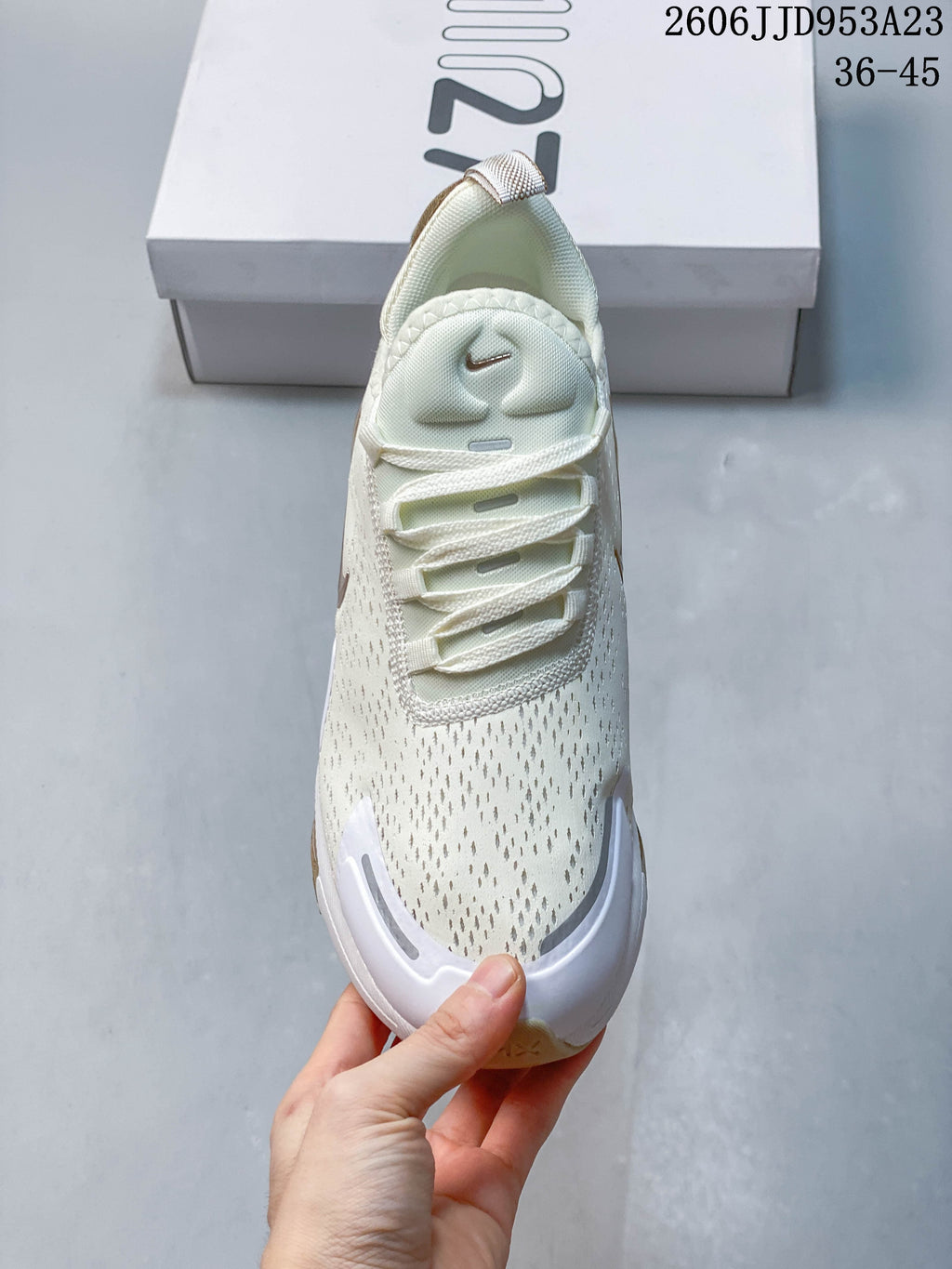 Front view showing the perforated-look upper and laces of a Nike Air Max 270 sneaker