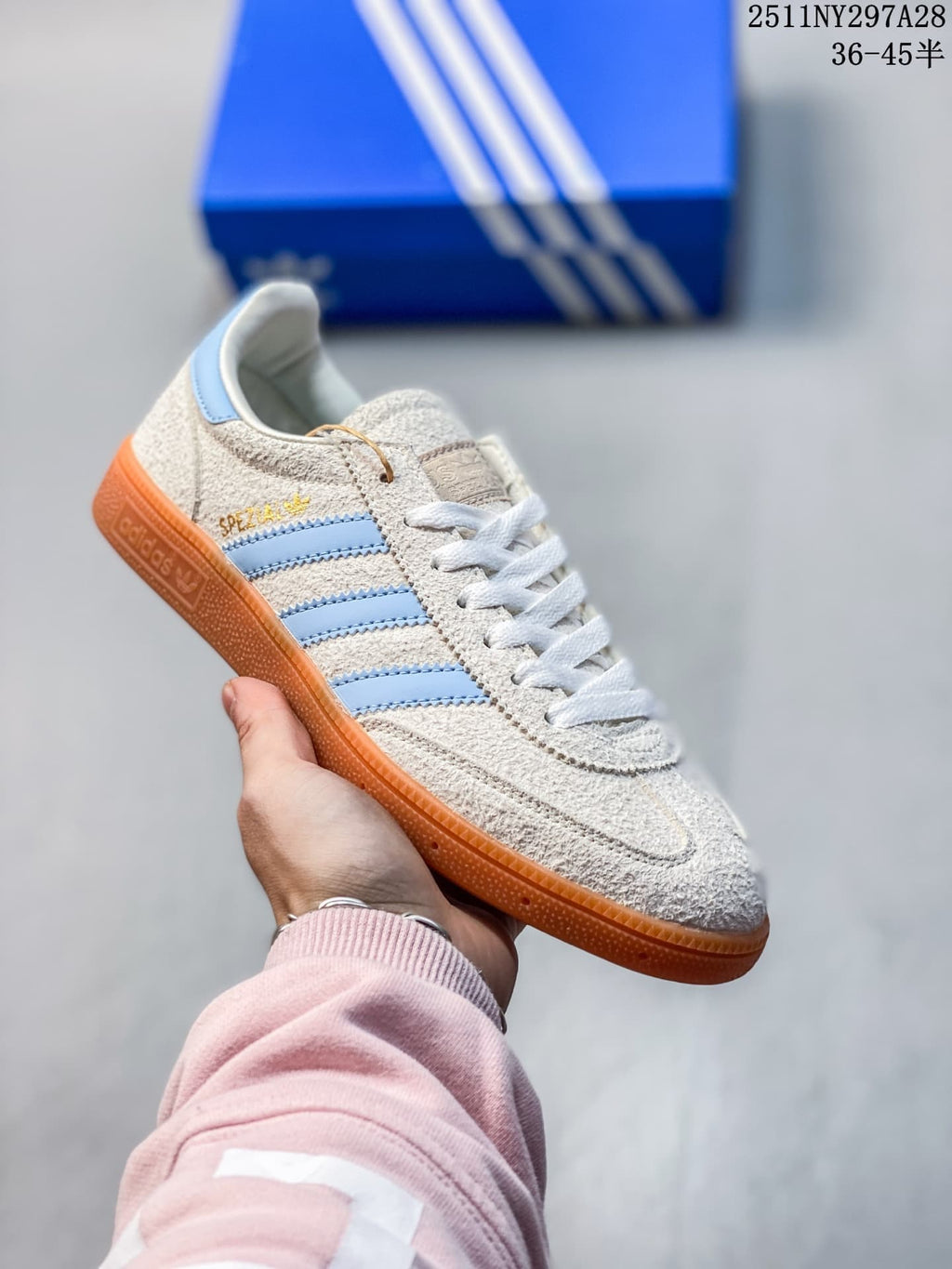 Cream adidas Handball Spezial sneaker with light blue stripes and a gum outsole