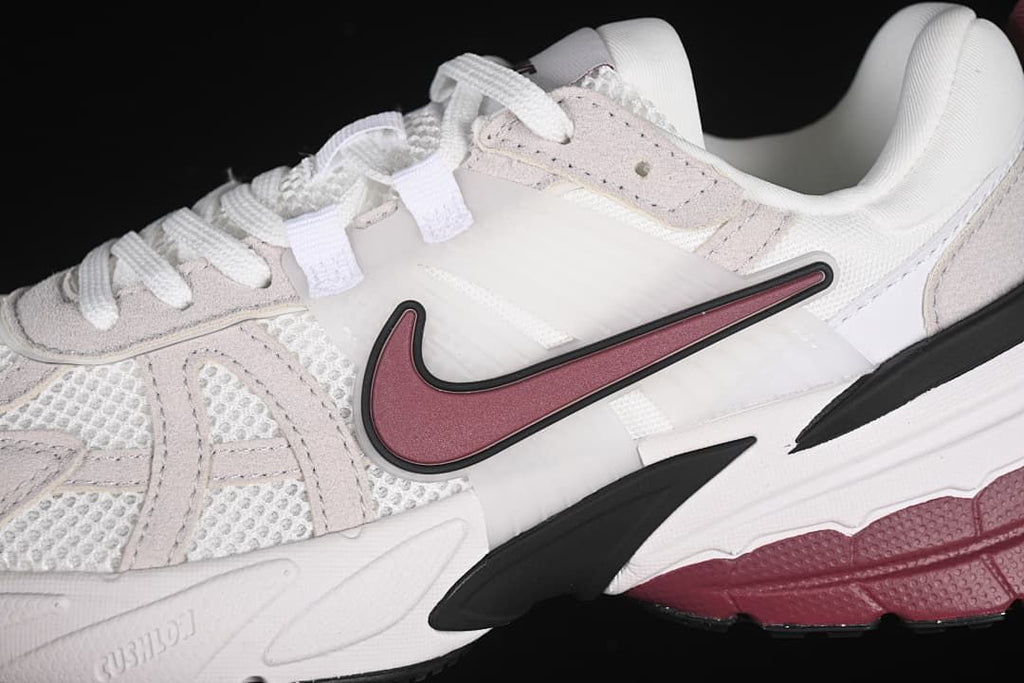 Close-up of the side Swoosh and layered upper details