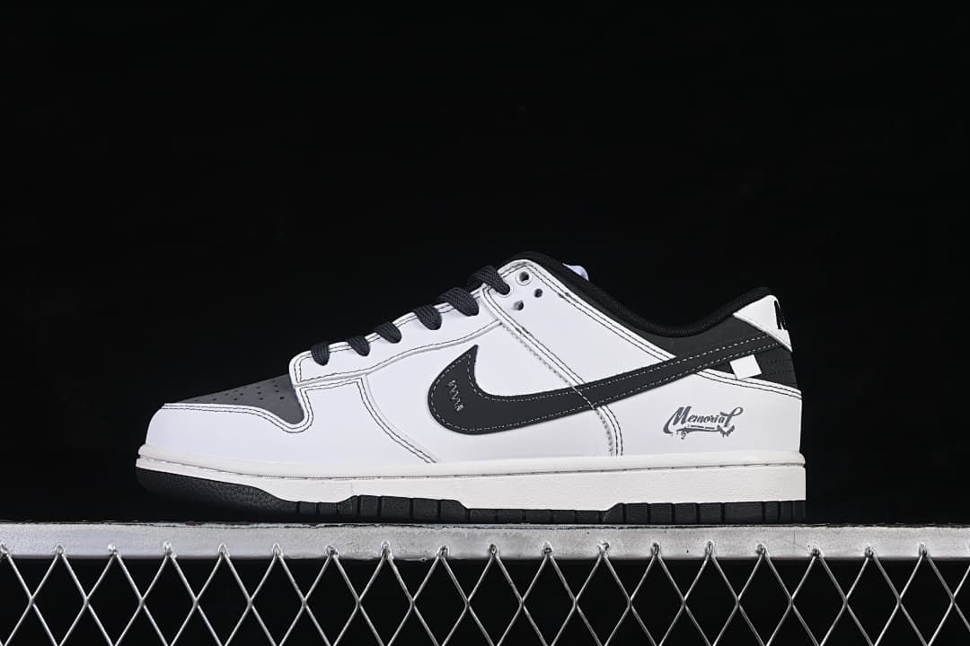 Side view of a white and black Nike SB Dunk Low sneaker