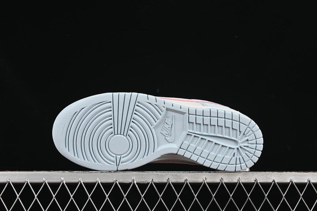 Underside view of the pale blue patterned outsole