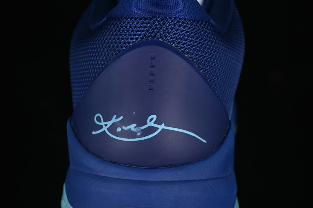Rear heel detail with signature graphic and mesh collar