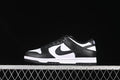 Side profile of a black-and-white Nike SB Dunk Low sneaker