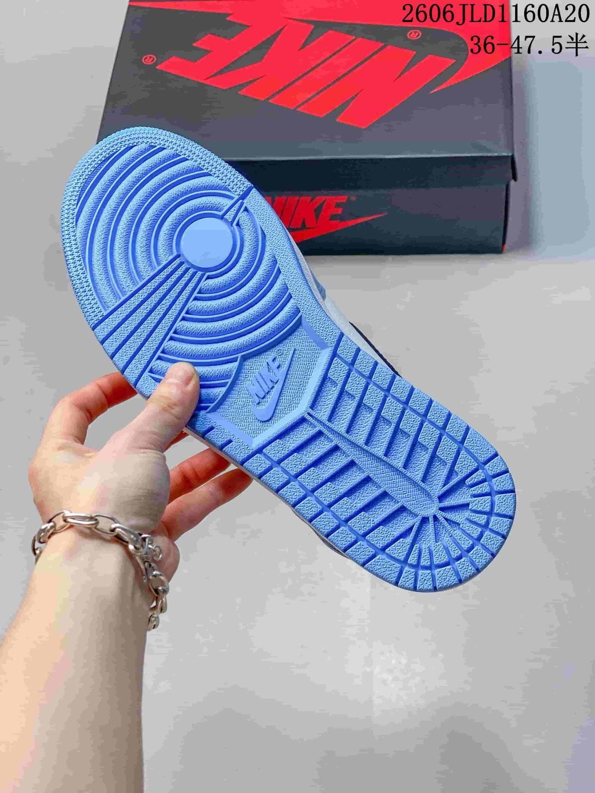 Blue patterned outsole of a high-top sneaker