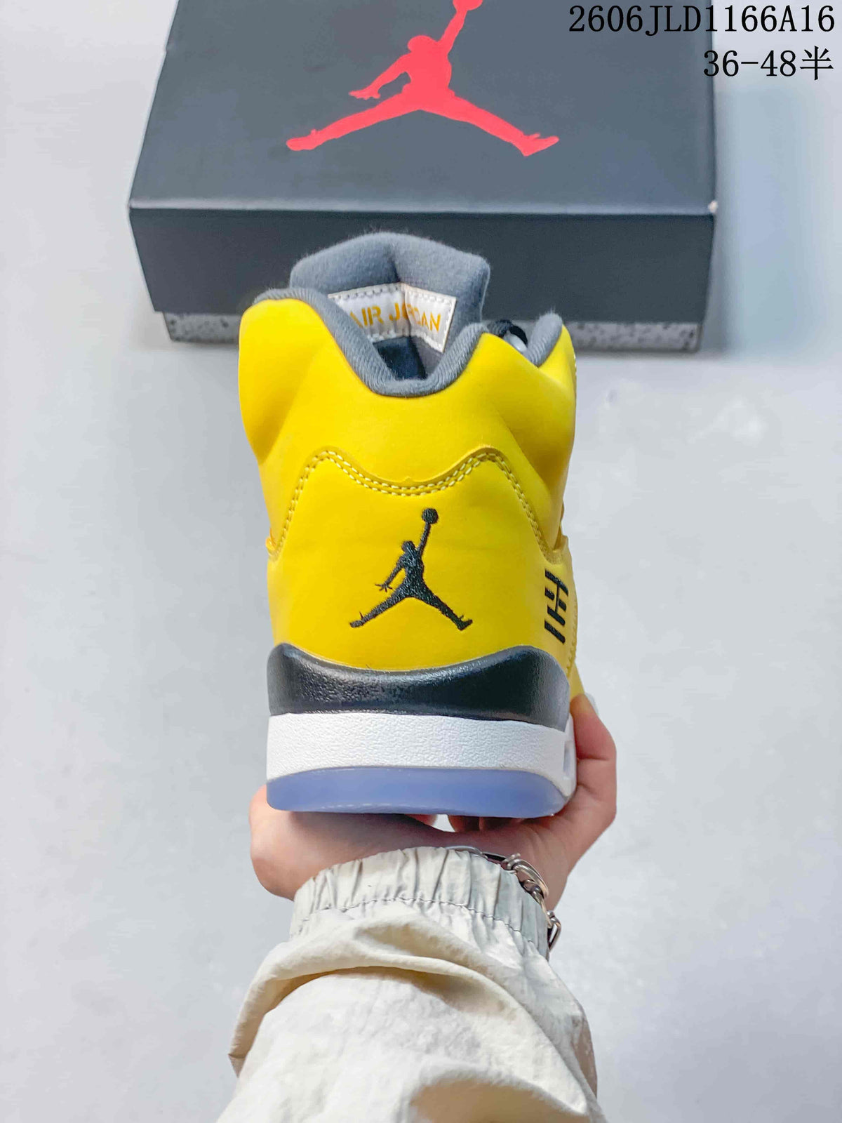 Rear view of the yellow Air Jordan 5 Retro sneaker showing the heel logo