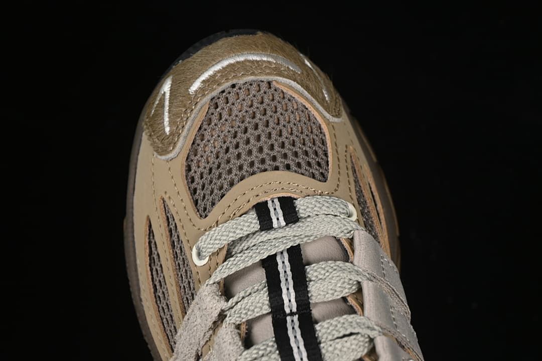 Top-down detail of the mesh toe and lacing