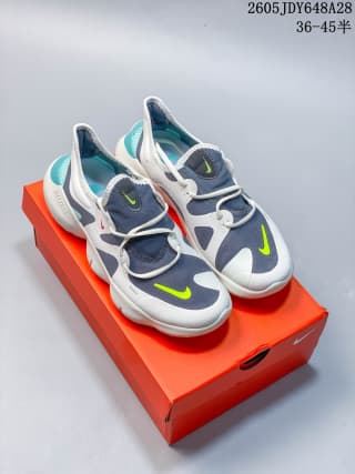 Pair of Nike Free RN 5.0 shoes displayed on an orange shoe box