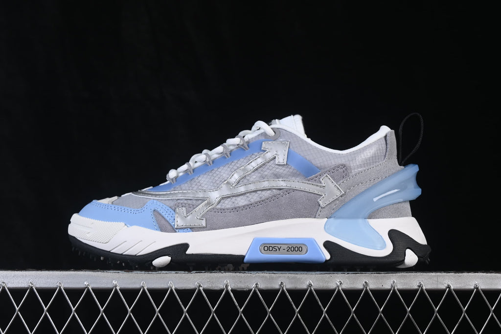 Side profile showing the ODSY-2000 midsole detail and sculpted sole