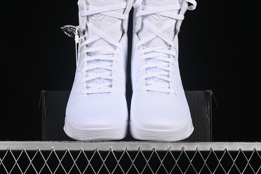 Front view of the pair showing the laces, tongues, and textured toes