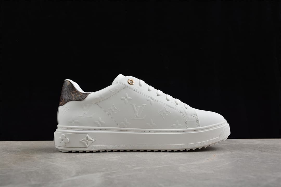 Side profile showing the embossed upper and platform sole