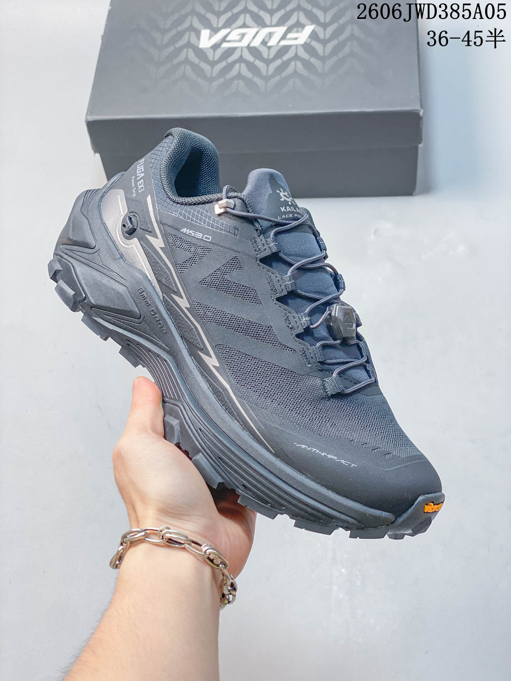 Angled view of the gray KAILAS Fuga Ex3 trail running shoe