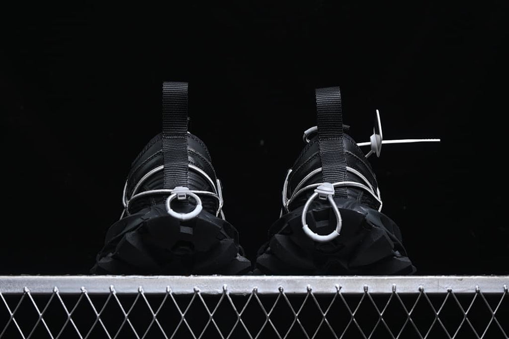 Rear view of the pair showing heel loops and cord details.