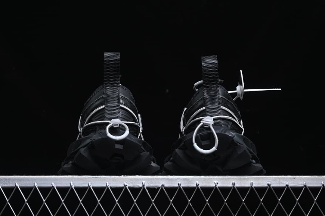 Rear view of the pair showing heel loops and cord details.