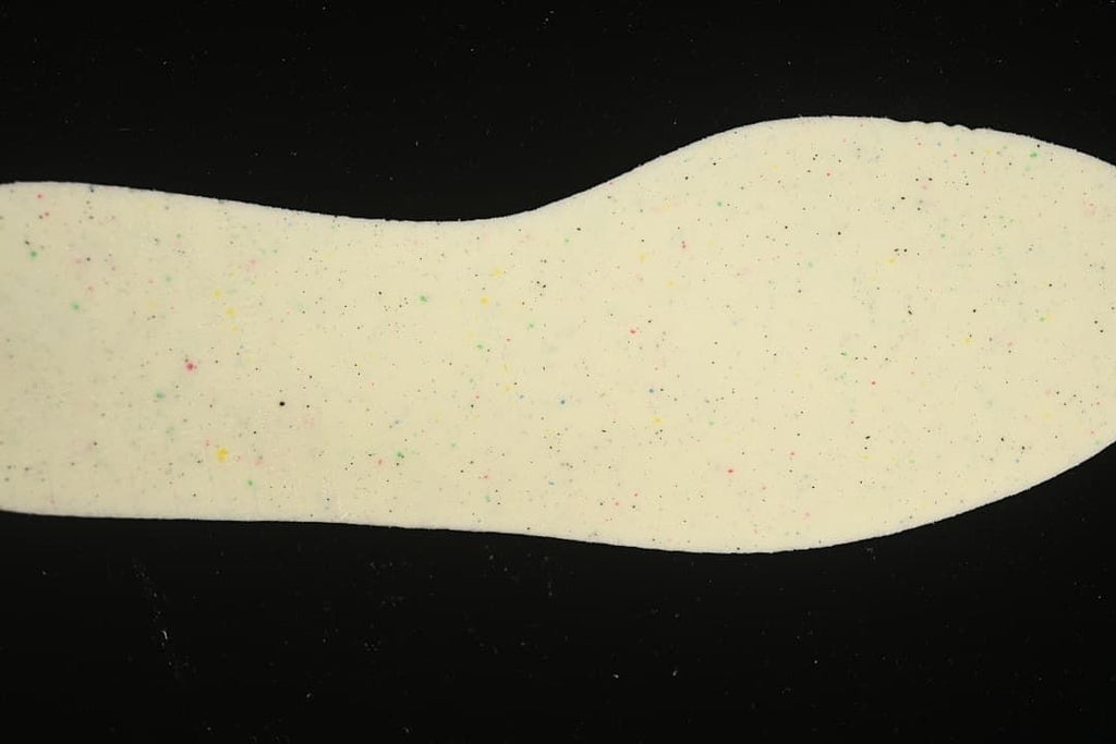 Close-up of the cream-colored insole with multicolor speckles
