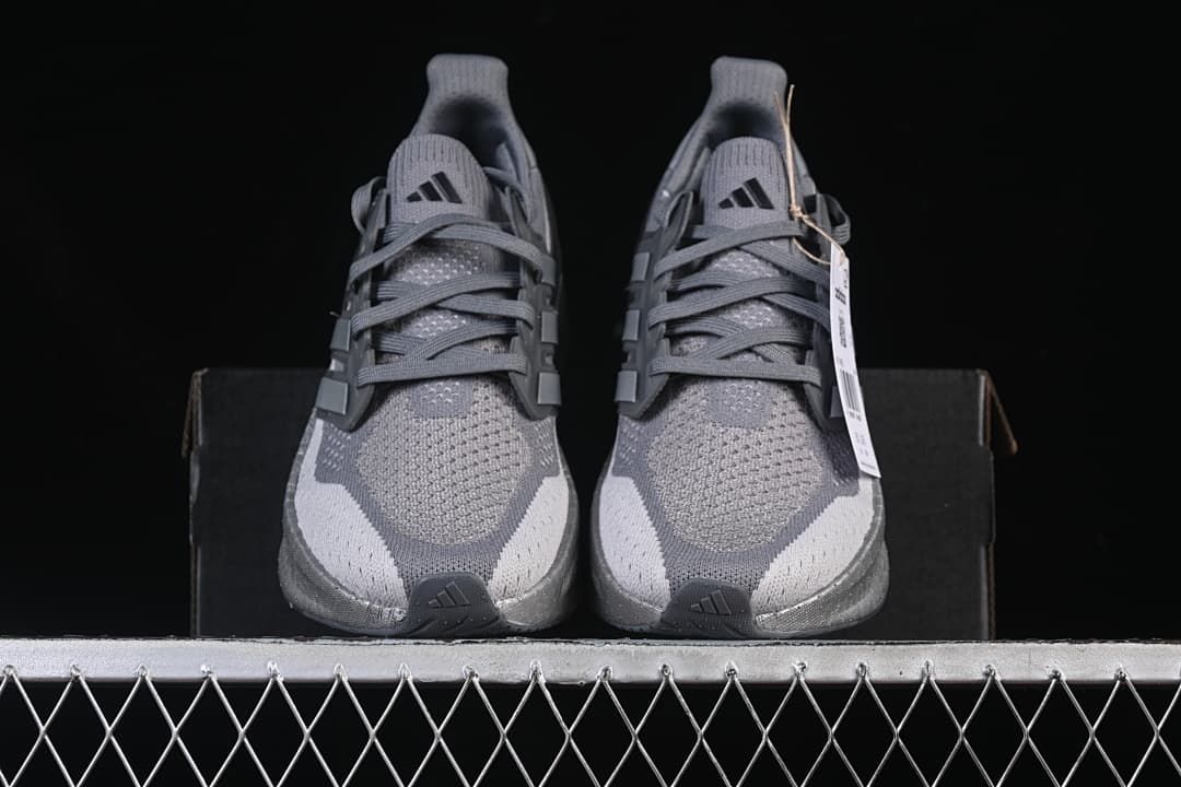 Front view of the pair showing the knit-look uppers and laces