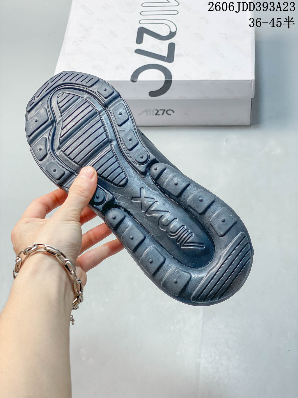 Outsole of a dark gray Nike Air Max 270 sneaker