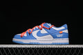 Side view of blue and white low-top sneakers with orange-red overlay laces and “LEFT” lettering.