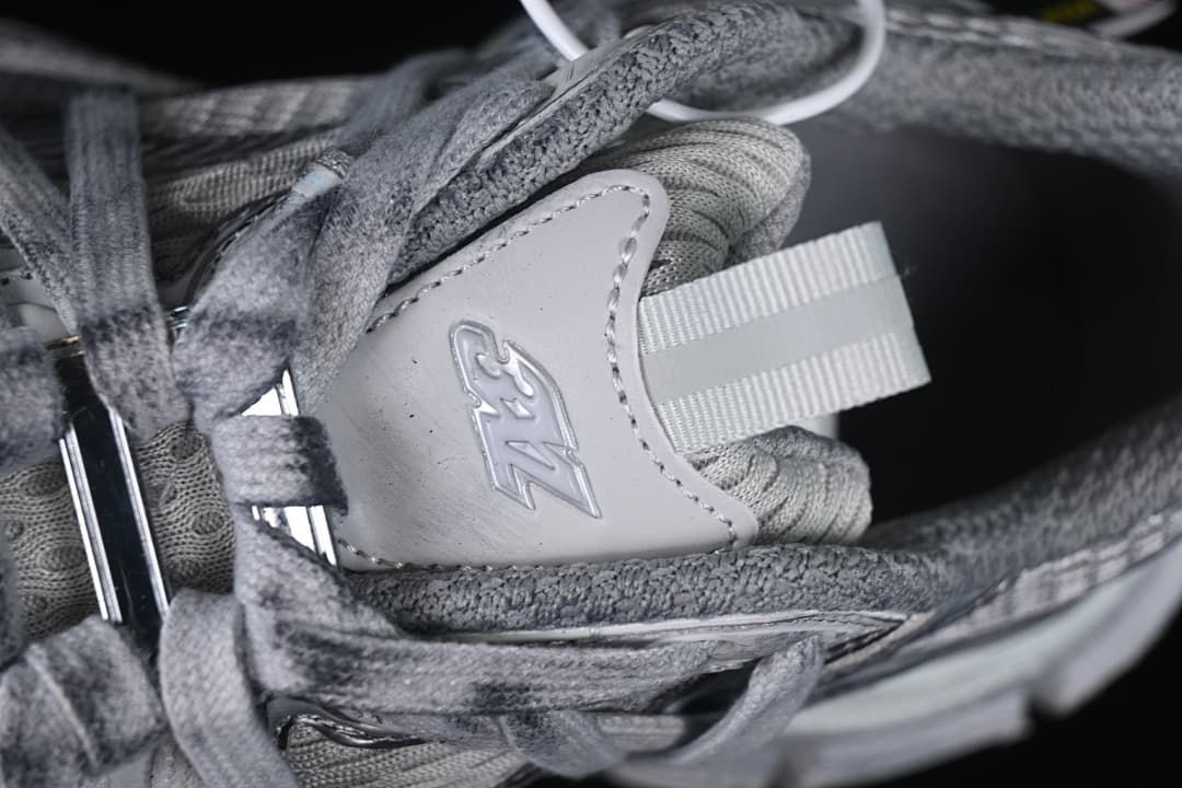 Close-up of the tongue, lace area, and pull tab