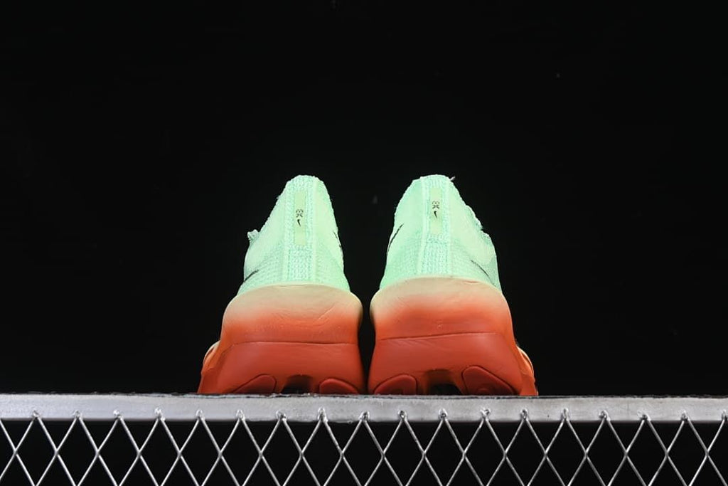 Rear view of both shoes showing the heel and outsole