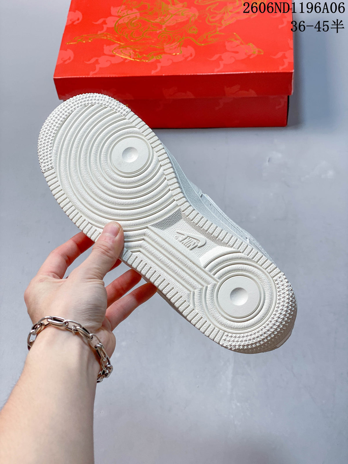 Underside view of the white sneaker outsole
