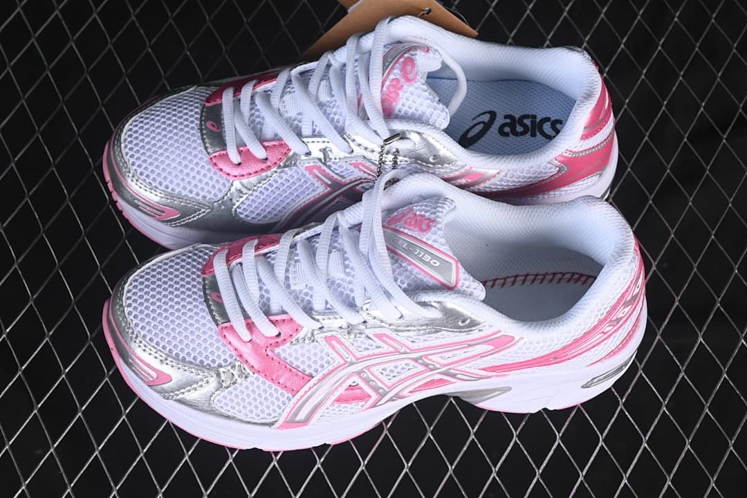 Pair of white, pink, and silver ASICS GEL-1130 sneakers shown from above.