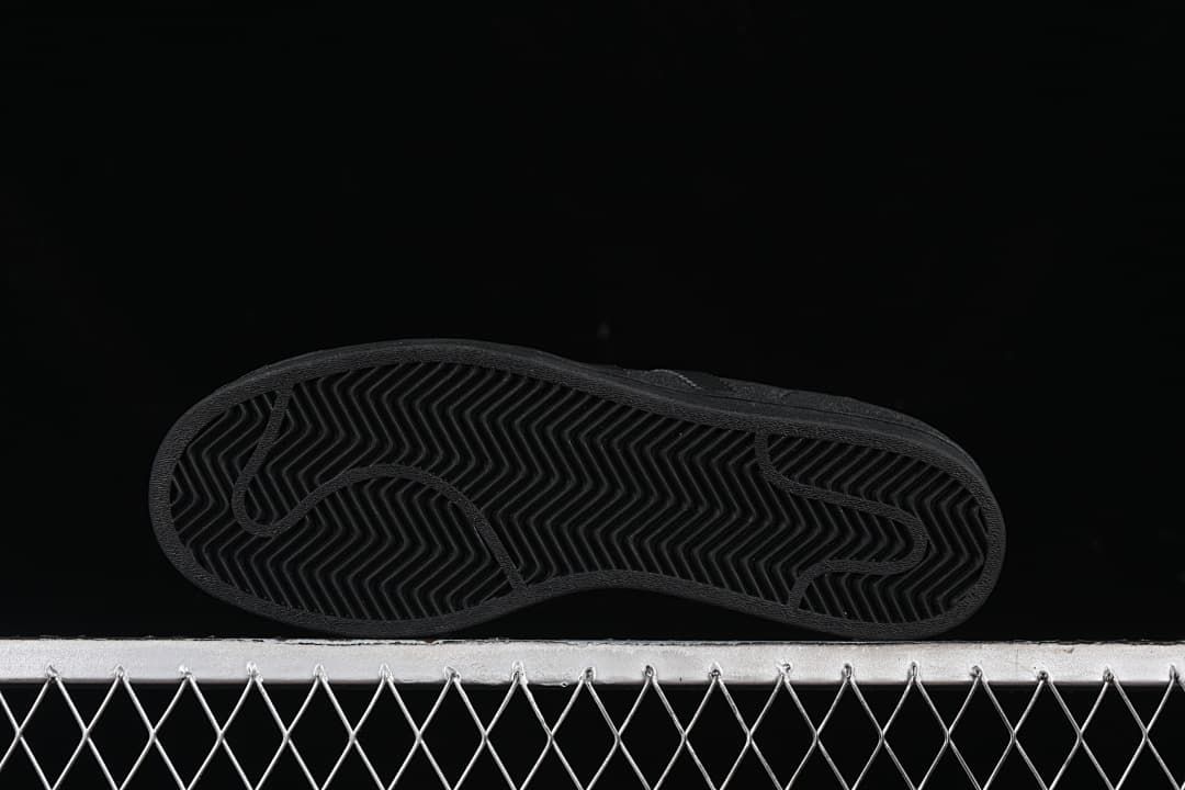 Underside view showing the black herringbone outsole tread
