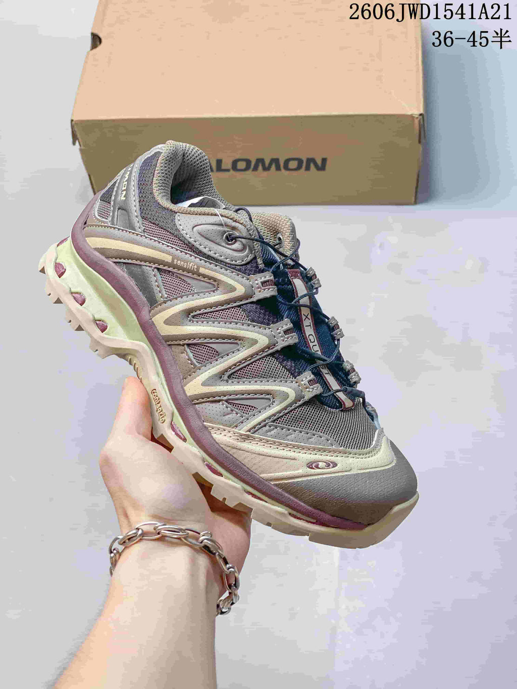 Angled side view of the gray Salomon XT-Quest ADV shoe