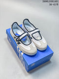 Adidas Samba Jane sneakers shown from above on a blue shoe box