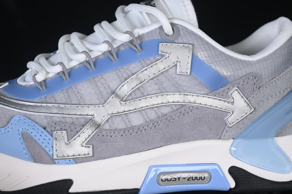 Close-up of the arrow-shaped side detail and ODSY-2000 midsole marking