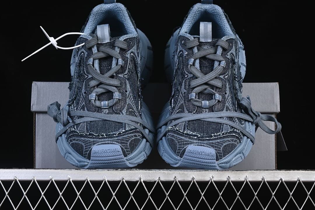 Front view of the pair showing their laces and layered panels