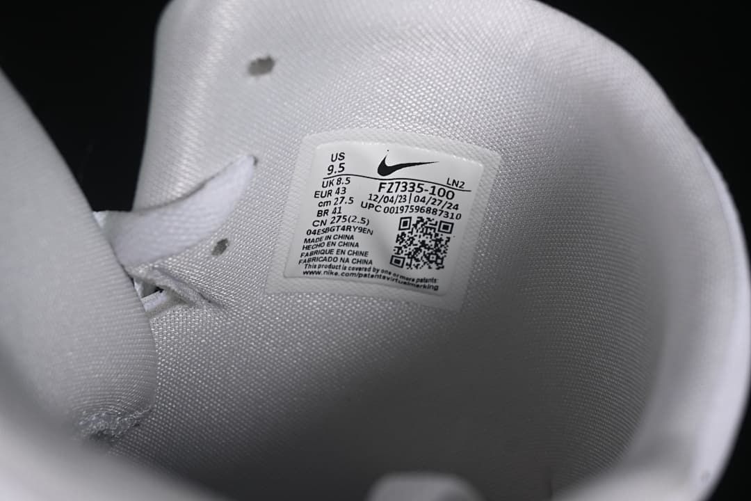 Interior size label showing US 9.5, EU 43, and style code FZ7335-100