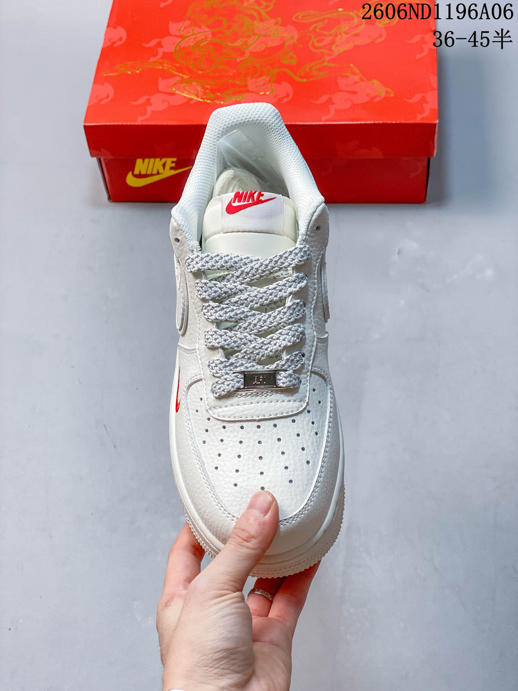 Top view showing the perforated toe and gray patterned laces