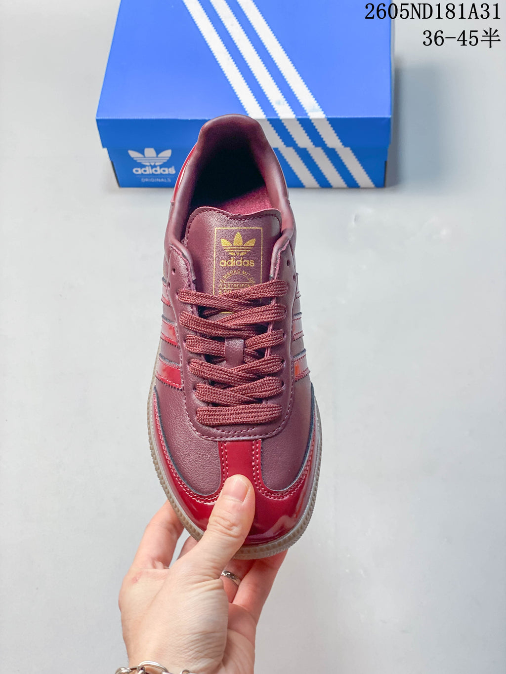 Top view showing the laces, tongue, and red toe accents
