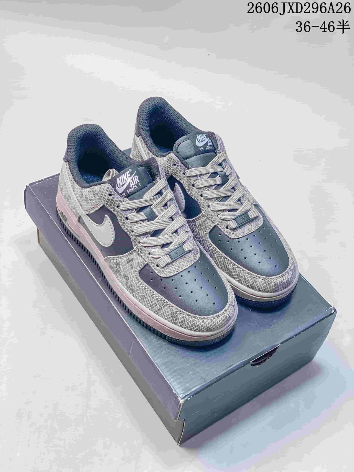 Charcoal and gray Nike Air Force 1 sneakers with pale Swooshes and patterned panels