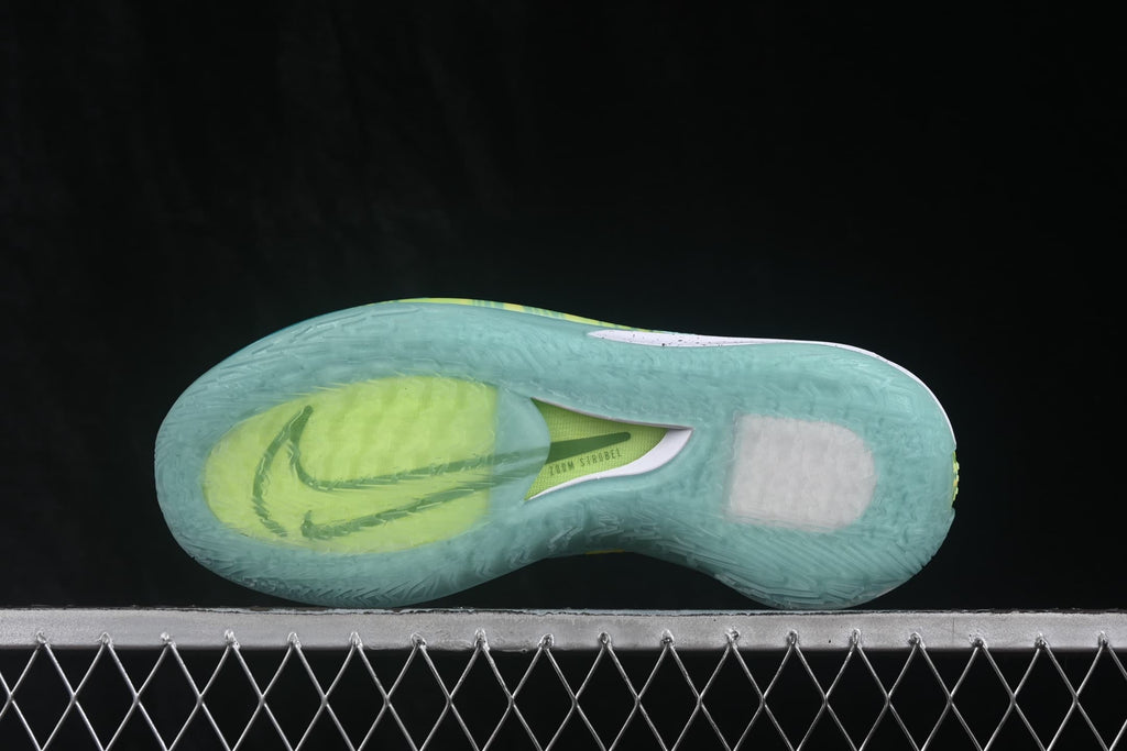 Underside view showing the translucent outsole, lime cushioning-area insert, and traction pattern.