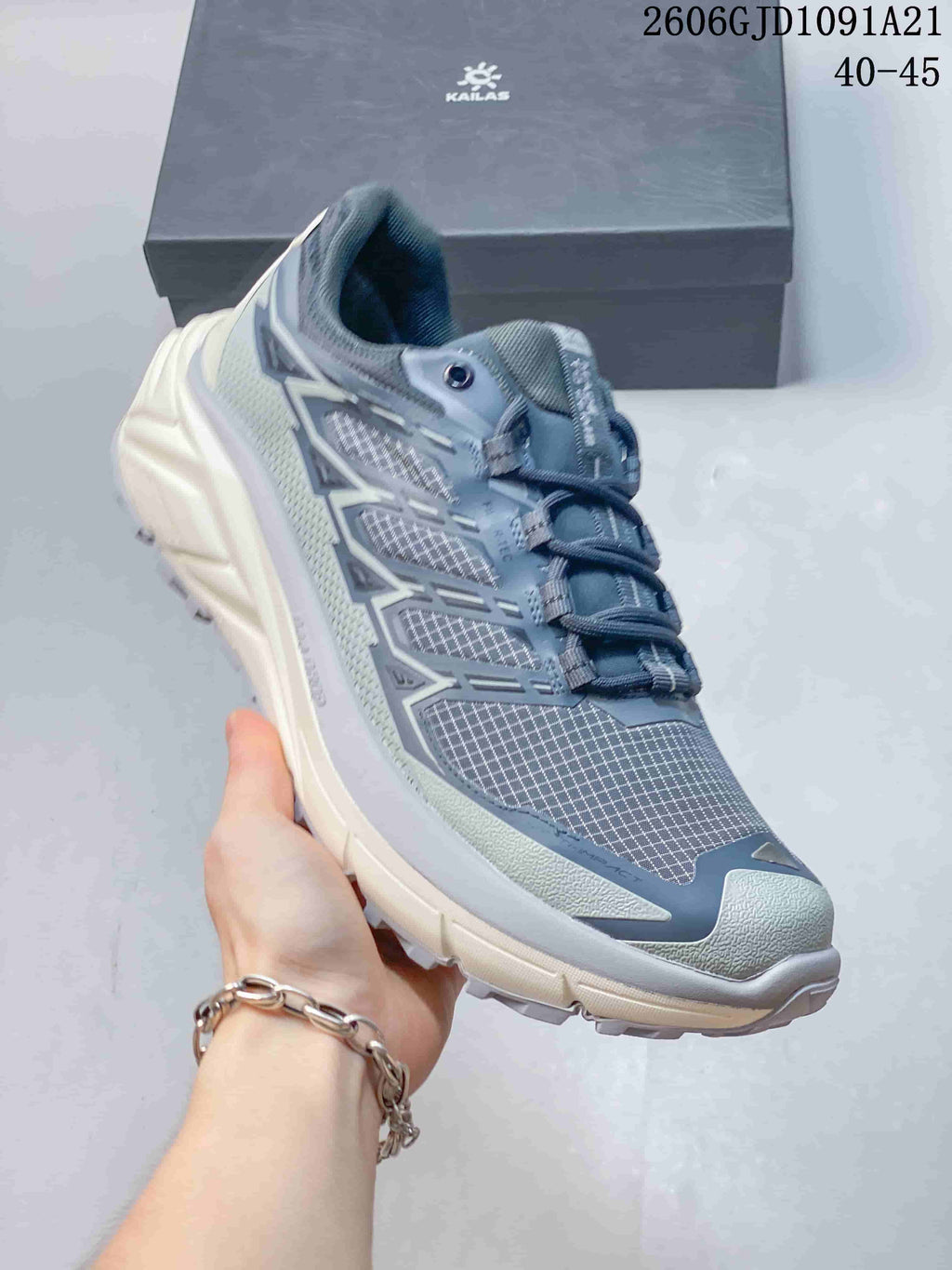 Angled side view highlighting the shoe's upper details and outsole profile