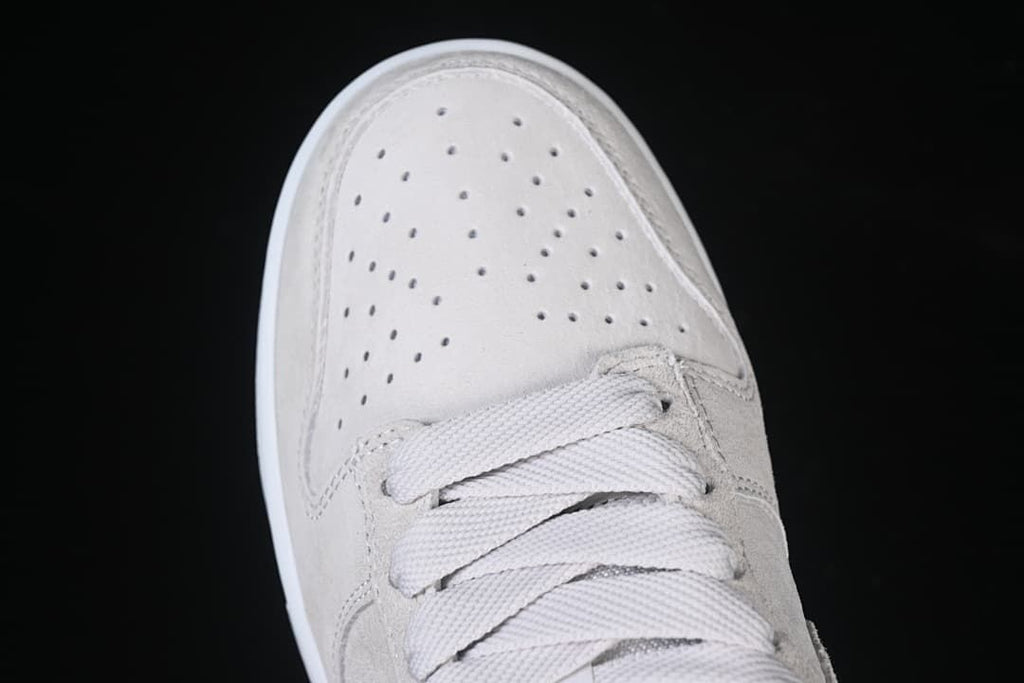 Top view of the perforated toe and laces