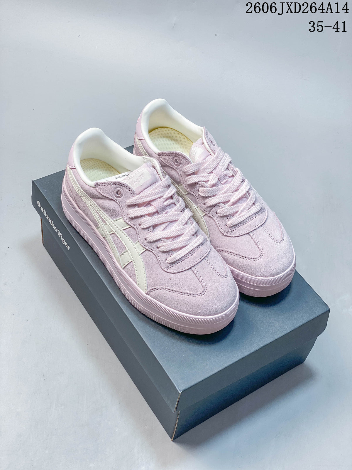 Pastel pink Onitsuka Tiger Tokuten Chunk low-top sneakers on a shoebox