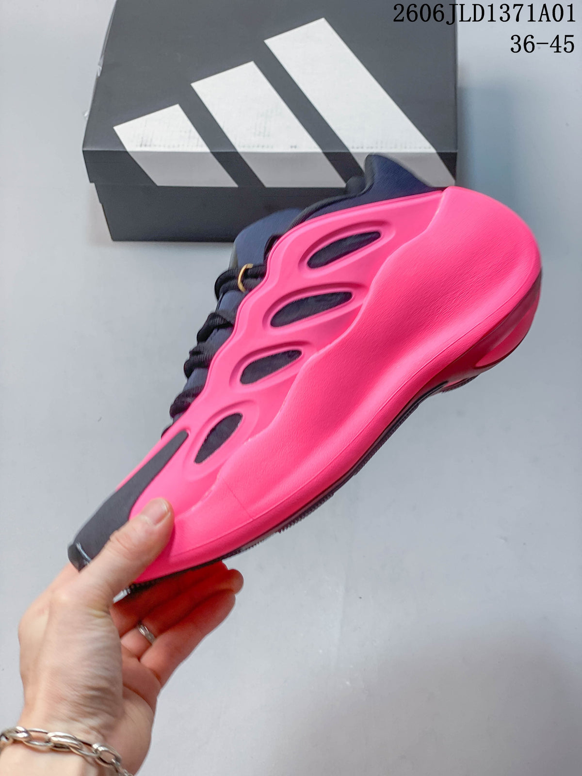 Side profile of an Adidas Hyperboost sneaker showing its sculpted pink side panel.