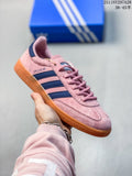 Pink adidas Handball Spezial sneaker with navy stripes and a gum outsole