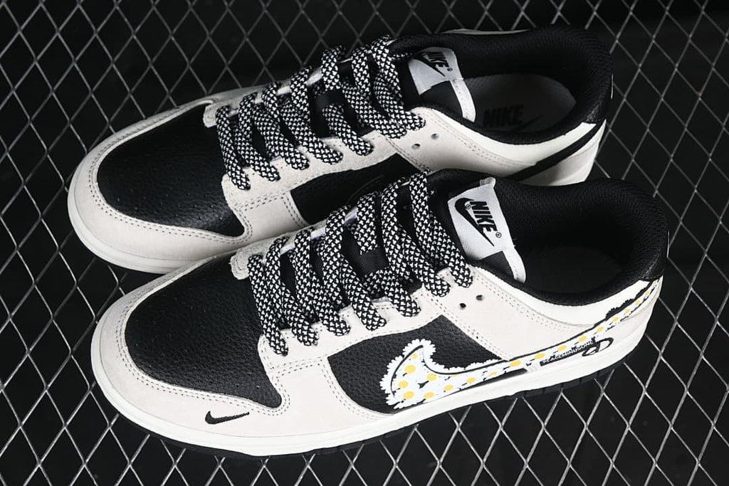 Pair of Nike SB Dunk Low sneakers displayed from above