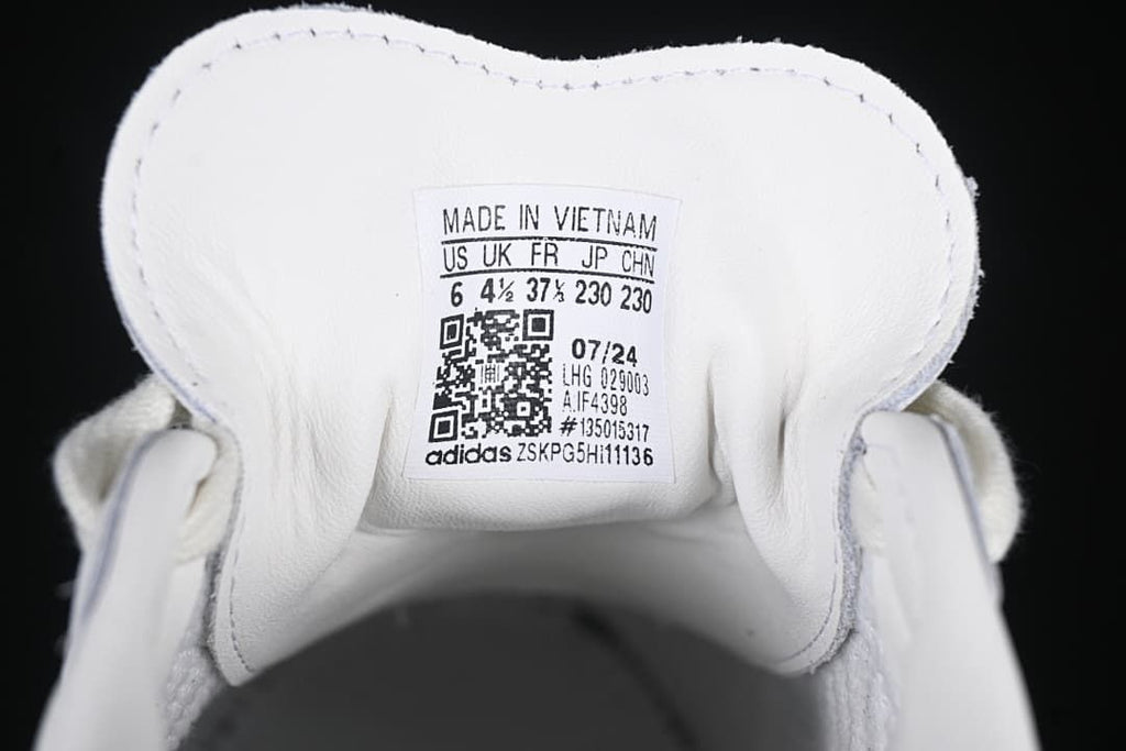 Shoe tongue label showing a sample size and style information
