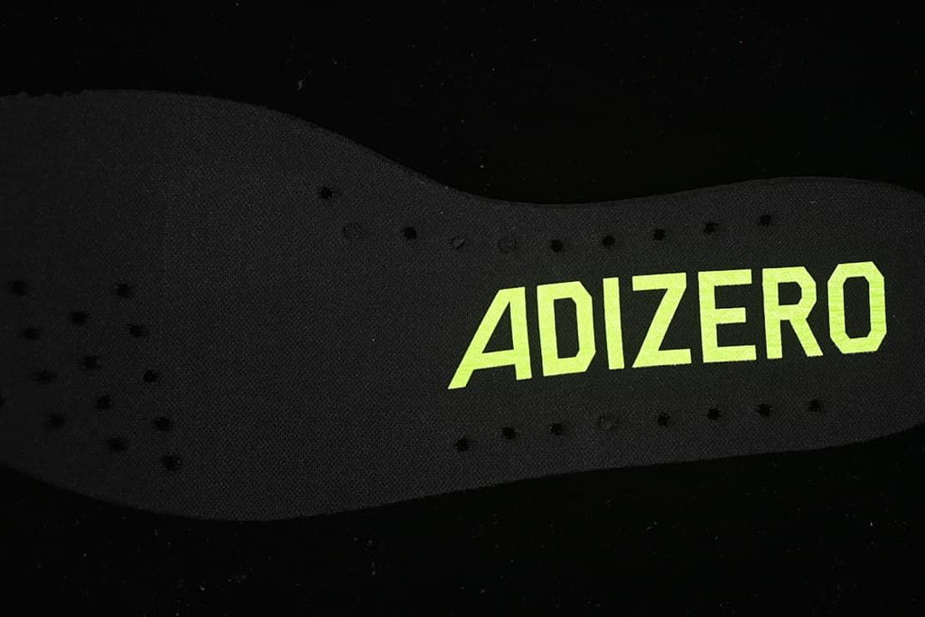 Close-up of the insole with Adizero lettering