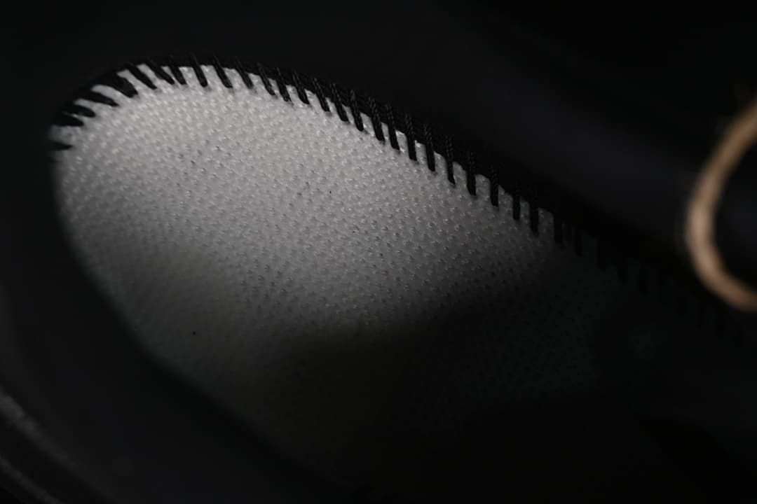Close-up of the shoe’s interior lining and stitching.