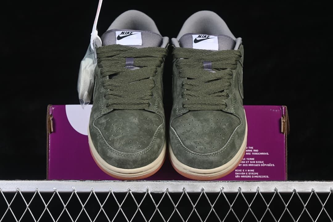 Front view of the pair showing perforated toe boxes and olive-green laces