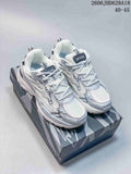 White and silver Off-White Be Right Back sneakers shown from above on a patterned box