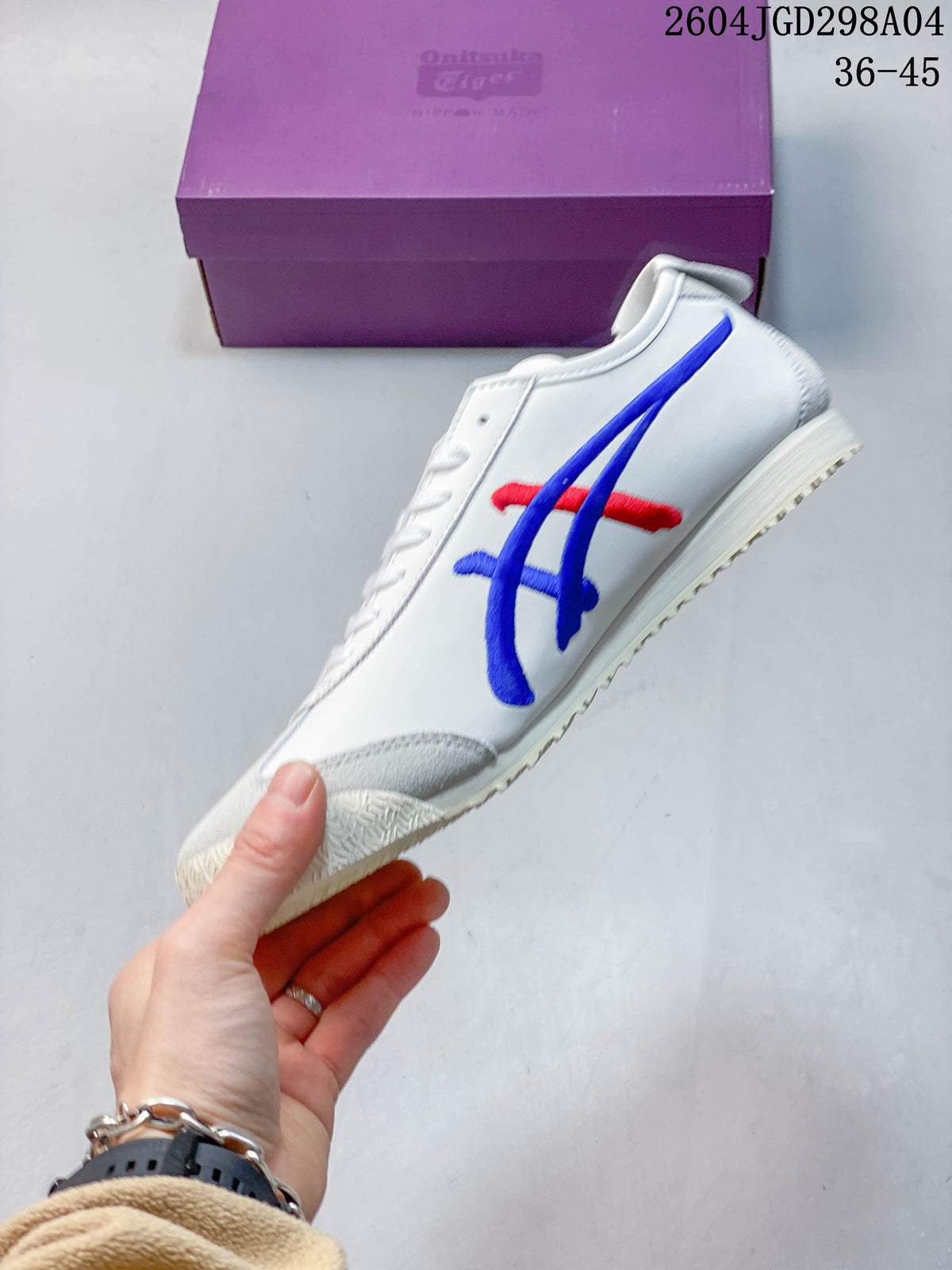 Side view of the white sneaker with blue and red detailing