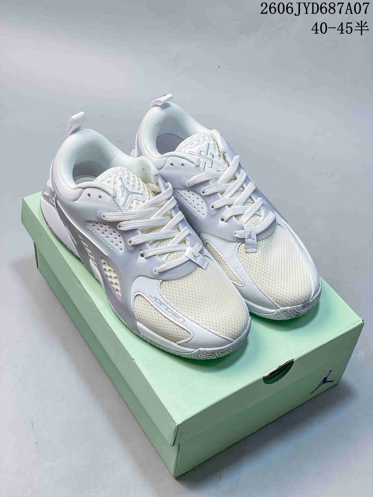 White and light gray Jordan Heir PF shoes shown from above on a mint-colored box.